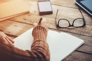 Woman writing in her diary.jpg